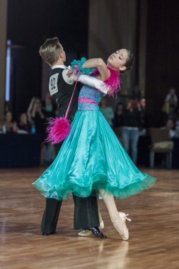 Minsk, Belarus-September 27, 2015: Lukashov Nikita and Kruisberg Sandrina Perform Juvenile-1 Standard Program on III International IDSA World Dance Championship Capital Cup Minsk- 2015 on September 27, 2015, in Minsk, Belarus