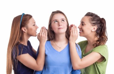 Rumors and Secrets Concept. Portrait of Three Happy Caucasian Females Sharing Secrets and Rumoring To each Other To Ears.