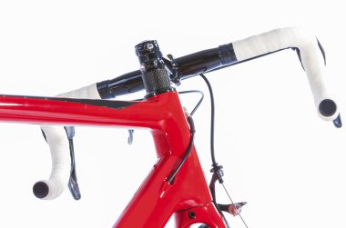 Bicycle Concept. Partial View of Professional Road Bike Handlebars With White Grip Tape