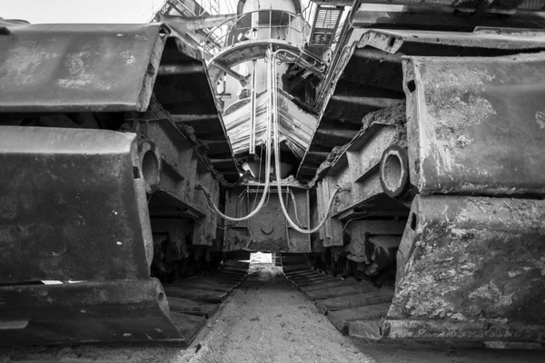 Caterpillar tracks of a mining machine — Stock Photo, Image