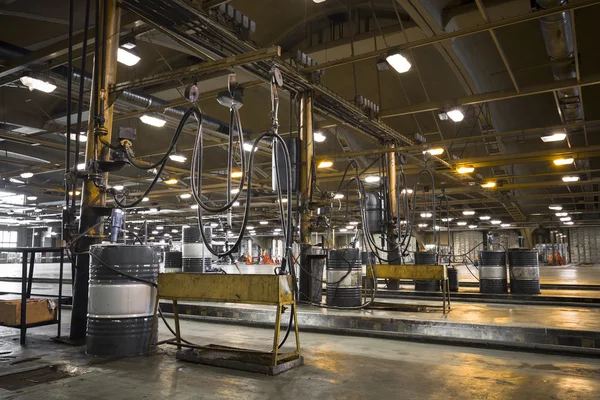 A liquid filling a bus garage construction — Stock Photo, Image