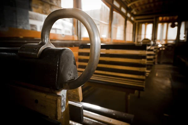 The inside of old electrical and yellow seats — Stok fotoğraf