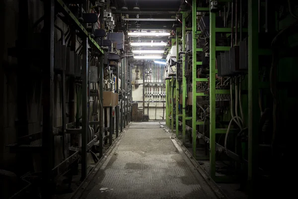 Electrical switchboards in an abandoned factory — Stock Photo, Image