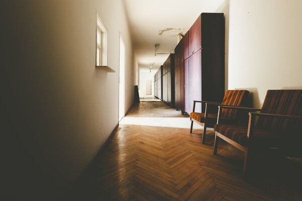 Corridor in an abandoned office building, furniture Royalty Free Stock Images