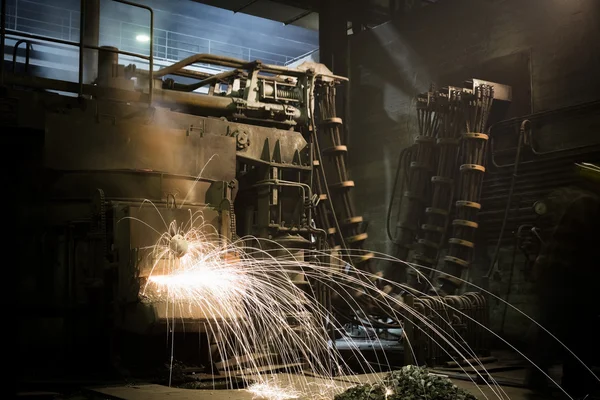 A furnace operating a foundry, poor light Stock Image