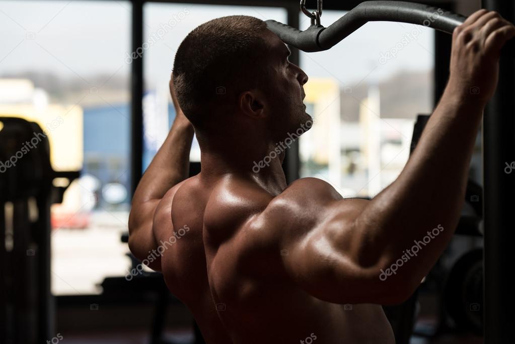 Man Doing Heavy Weight Exercise For Back