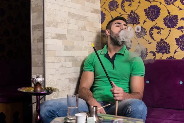 Man Smoking Shisha In The Arabic Cafe — Stock Photo, Image