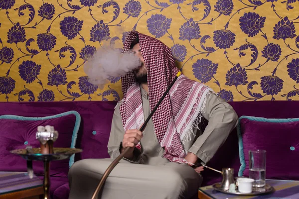 Islamic Man Smoking Shisha In The Arabic Cafe — Stock Photo, Image