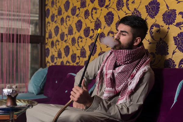 Arab Man Smoking Shisha And Drinking Coffee — Stock Photo, Image