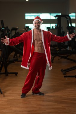 Noel Baba kostümlü maço erkek portresi