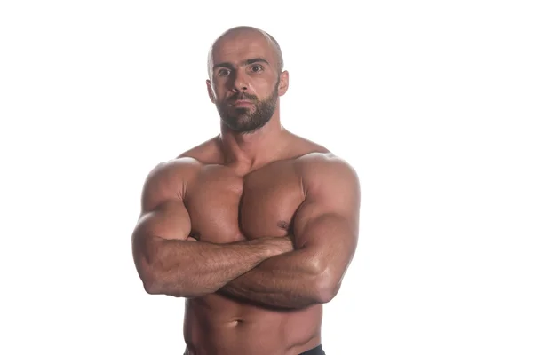 Portrait d'un bodybuilder posant sur fond blanc — Photo