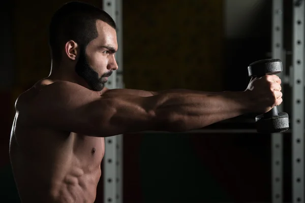 Shoulders With Dumbbells Exercise In A Gym — Stock Photo, Image