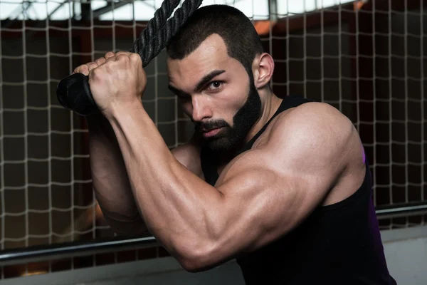 Bodybuilder Doing Heavy Weight Exercise For Triceps With Cable — Stock Photo, Image