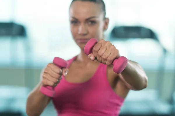 Woman Fighter Ready To Fight With Dumbbels