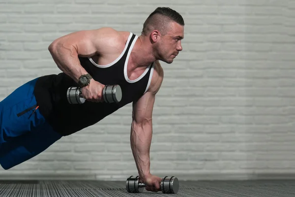 A súlyzó pushups — Stock Fotó