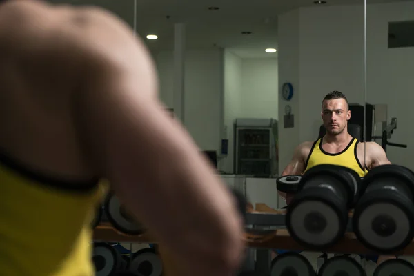 Young Man With Dumbbells Exercising Shoulders — Stock Photo, Image