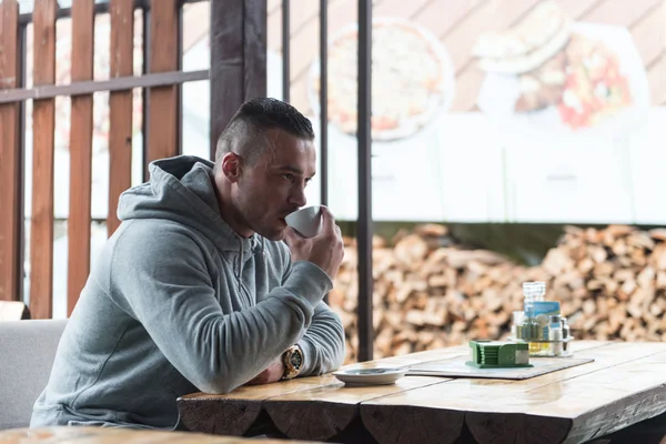 Young Man Drinks Coffee Outdoor — Stock Photo, Image