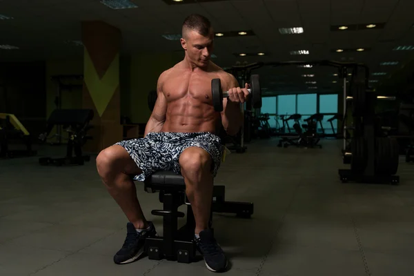 Young Man With Dumbbells Exercising Biceps — Stock Photo, Image