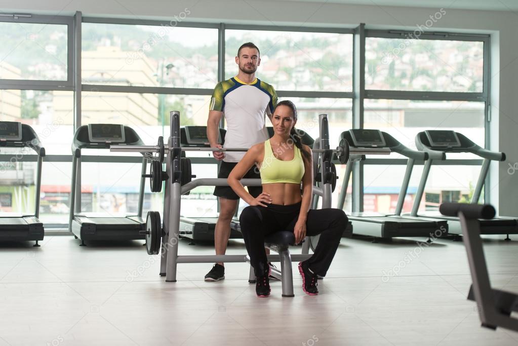 Fit Couple Together Training Chest With Weights