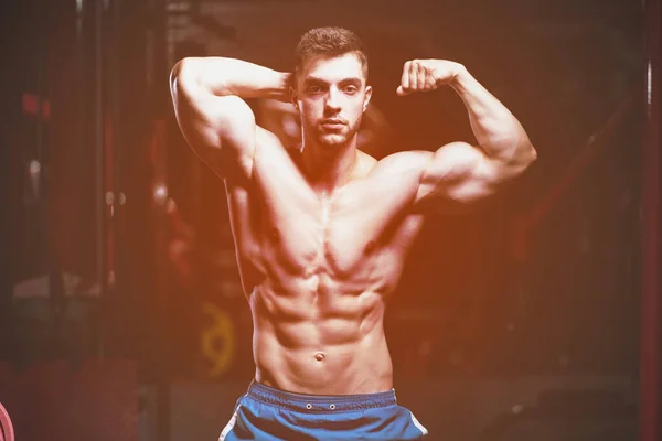Young Man Showing Abdominal Muscle — Stock Photo, Image