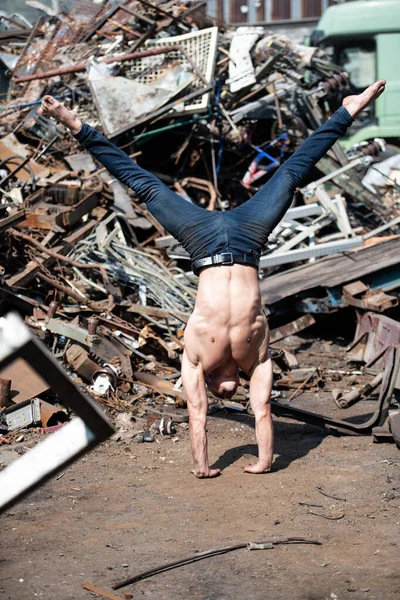 Handsome Man Keeping Balance Hands Old Industrial Junk Yard Muscular — Stock Photo, Image