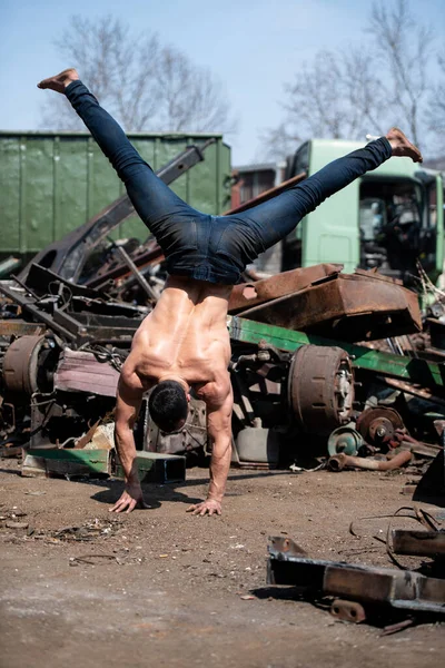 Young Man Keeping Balance Hands Old Industrial Junk Yard Muscular — 스톡 사진