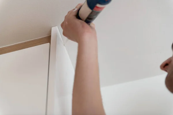 Construction Worker Use Gun Silicone Tube Repairing Installing Ceiling House — Stock Photo, Image