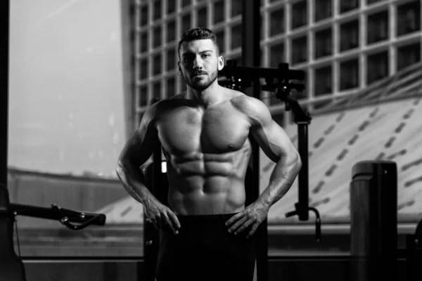 Handsome Young Man Standing Strong Gym Flexing Muscles Muscular Athletic — Stock Photo, Image