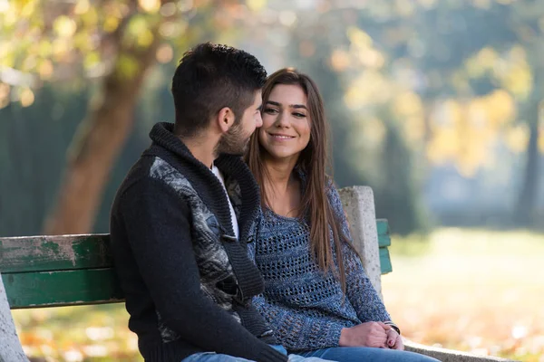 Young Couple Sitting Bench Beautiful Autumn Day — Stock Photo, Image
