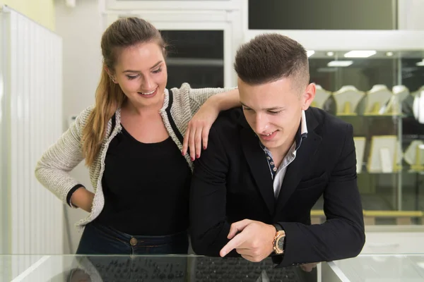 Attractive Young Couple Inspecting Selection Rings While Her Loving Boyfriend — Stock Photo, Image