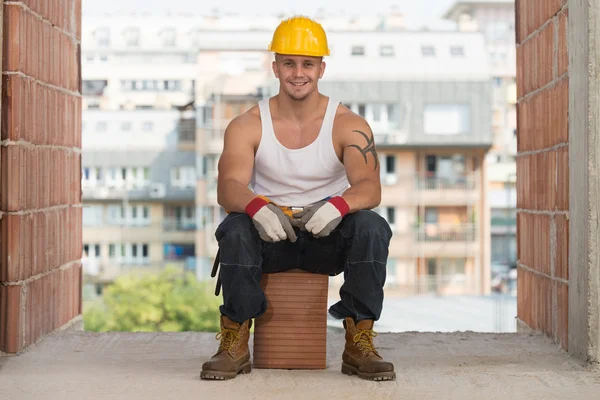 Worker Is Resting Sitting On Brick — Stock Photo, Image