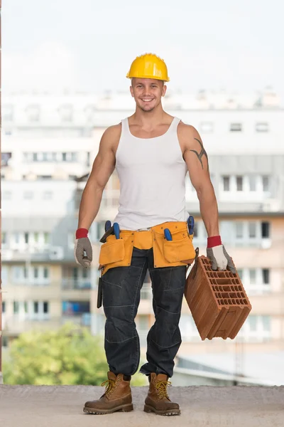 Construction Worker At Work With Brick — Stock Photo, Image