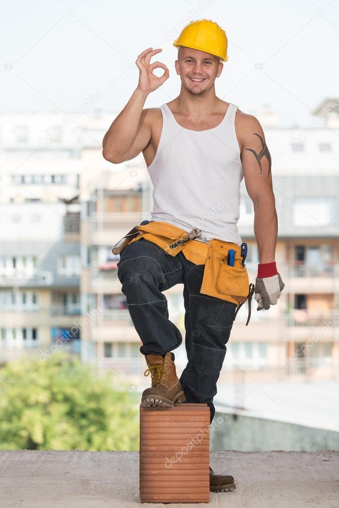 Worker With Protective Gear Showing Ok Sign