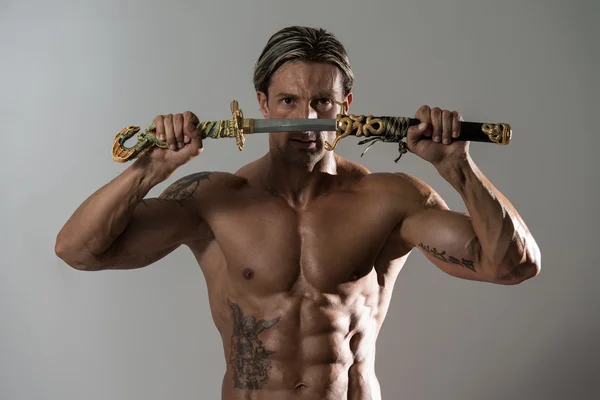 Mature Man Holding Sword Ready To Fight — Stock Photo, Image