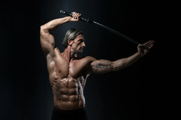 Mature Man Holding Sword Ready To Fight — Stock Photo, Image