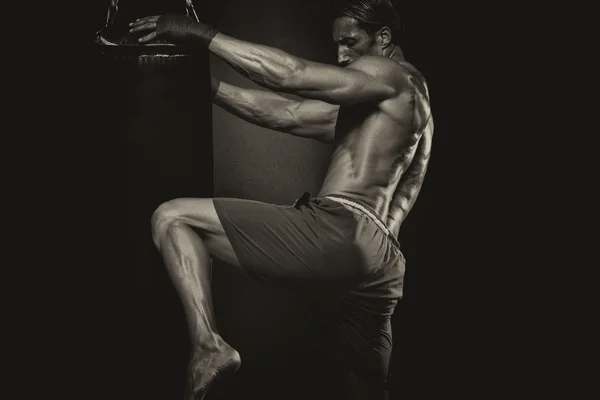 MMA Fighter Practicing Some Kicks With Punching Bag — Stock Photo, Image