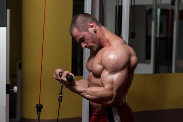 Muscular Man Doing Heavy Weight Exercise For Biceps — Stock Photo, Image