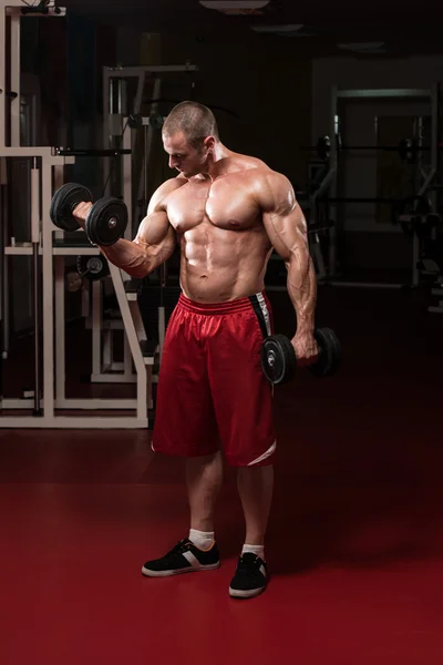 Muscular Man Doing Heavy Weight Exercise For Biceps — Stock Photo, Image