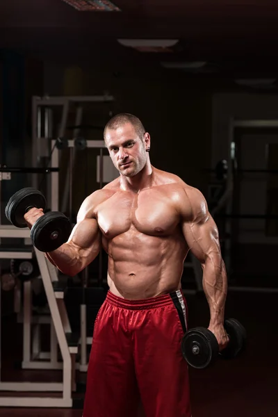 Bodybuilder Exercise With Dumbbells — Stock Photo, Image