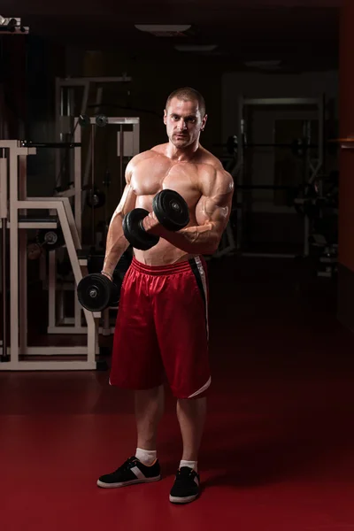 Healthy Young Man Doing Exercise For Biceps — Stock Photo, Image