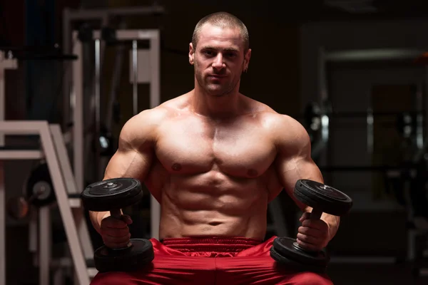 Young Man Doing Exercise For Biceps — Stock Photo, Image