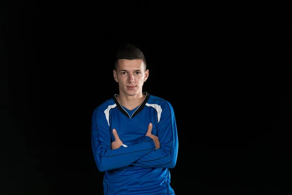 Voetbal speler staande portret — Stockfoto