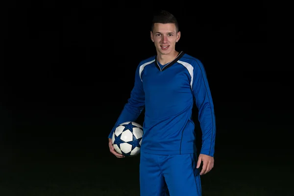 Retrato de um jogador de futebol e bola — Fotografia de Stock