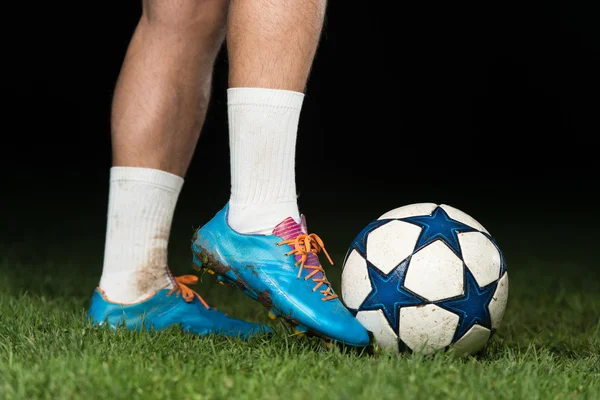 Legs Of Player With Ball On Dark Background — Stock Photo, Image