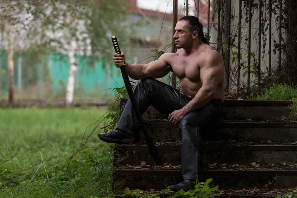 Dangerous Man Portrait With Ancient Sword — Stock Photo, Image