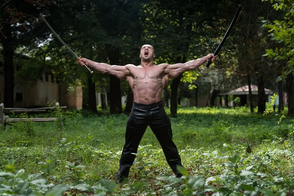 Fighter Holding Ancient Sword — Stock Photo, Image