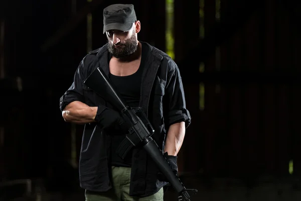 Beard Man With A Machine Gun — Stock Photo, Image