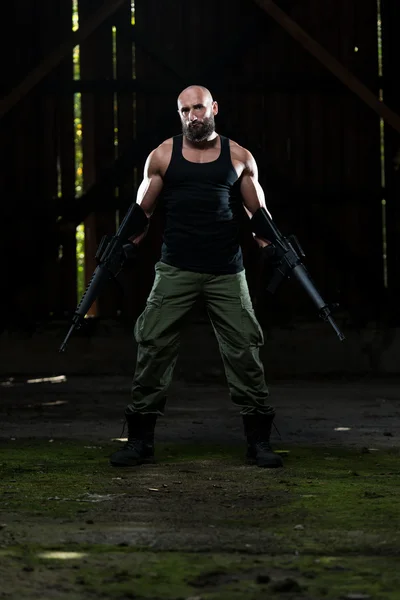 Portrait Of A Man With Machine Gun — Stock Photo, Image