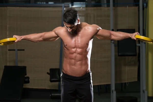 Ajuste atleta haciendo ejercicio para el hombro — Foto de Stock