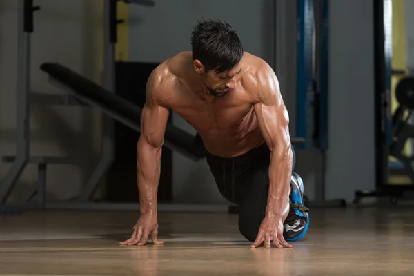 Strong Muscular Men Kneeling On The Floor — Stock Photo, Image